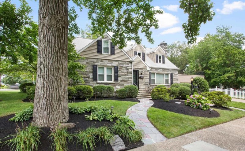 Craftsman Home with Landscaping Trees